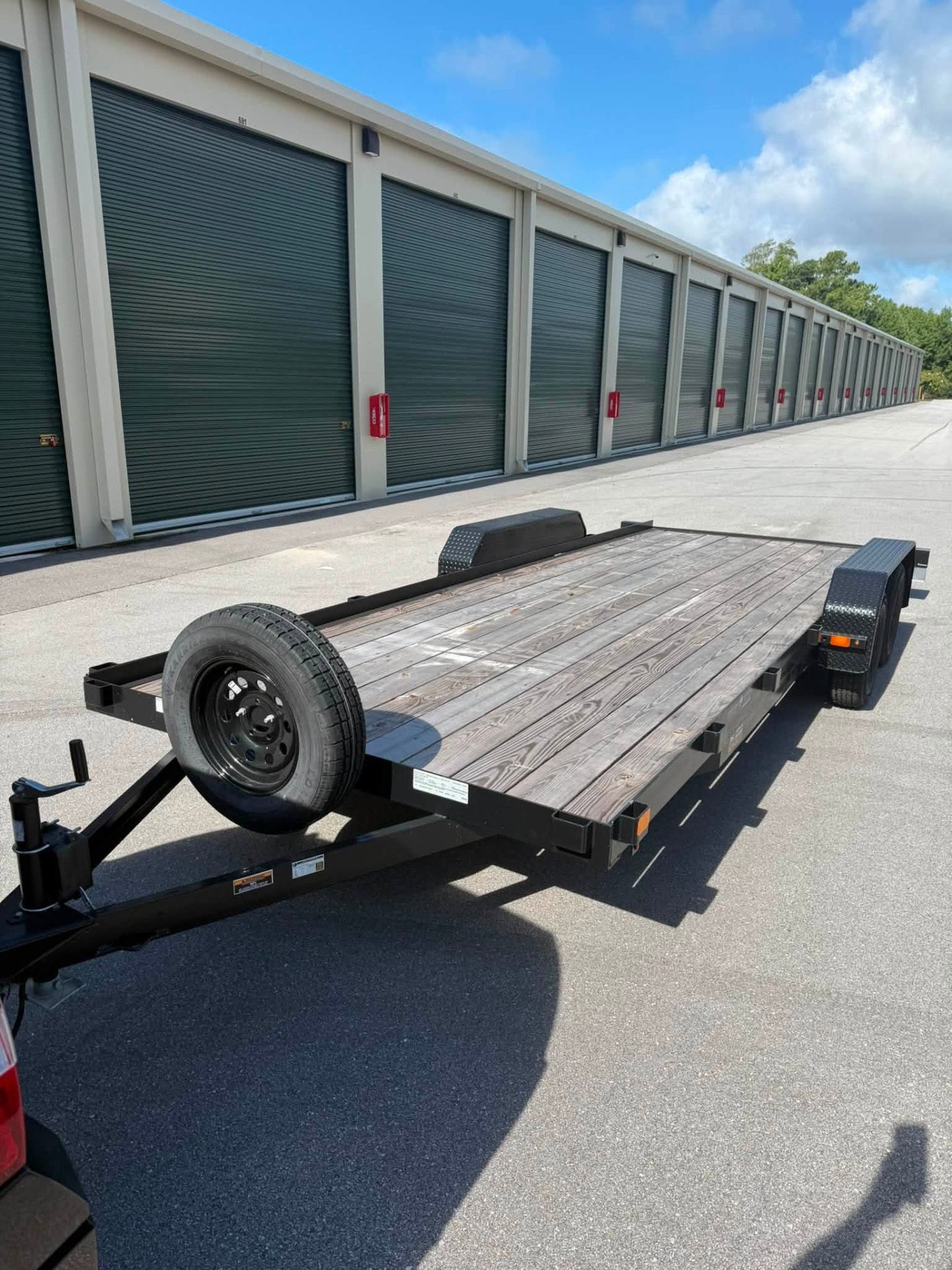 Salty Hands 20-foot flatbed trailer ready for hauling in Emerald Isle, NC